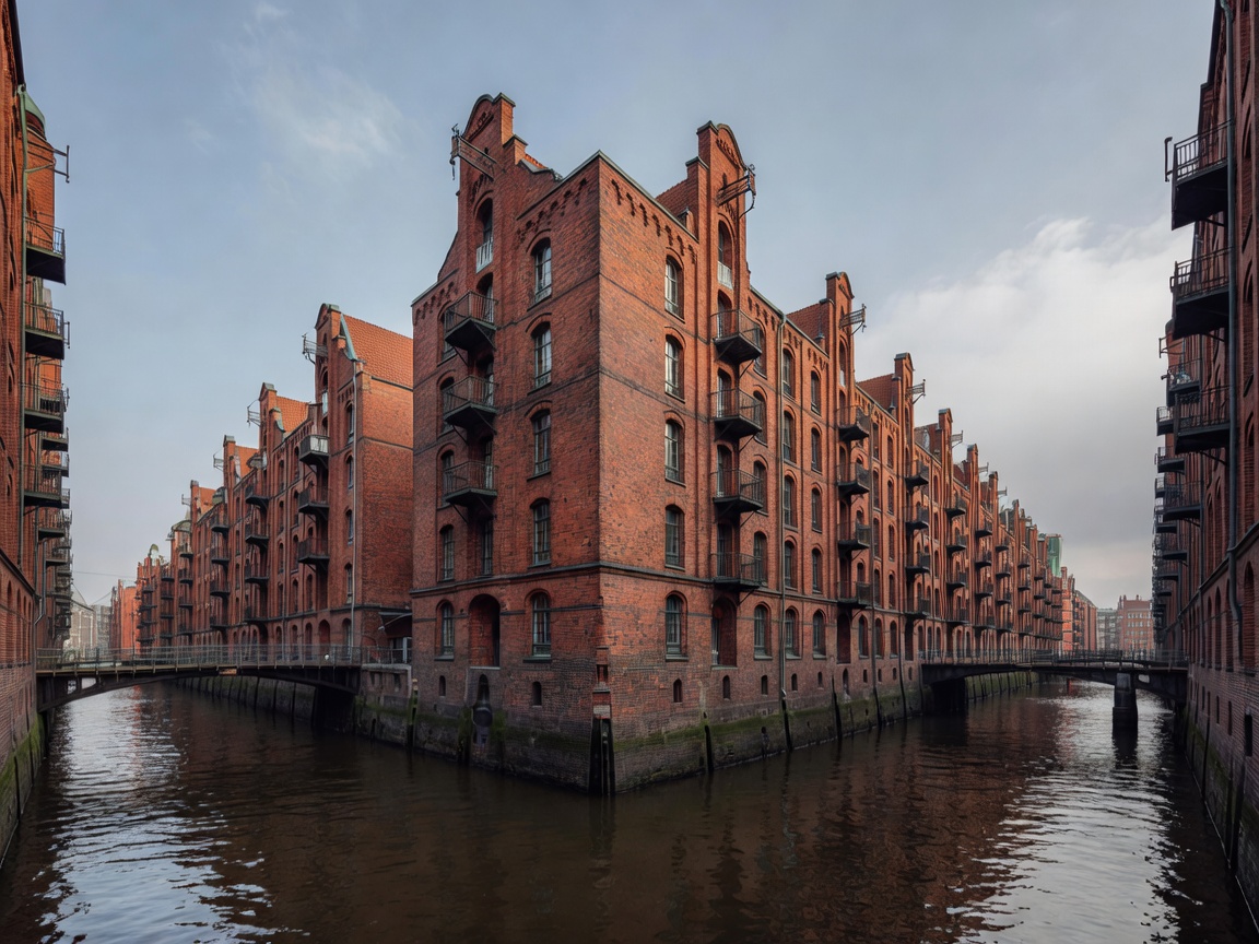 Speicherstadt canal in Hamburg with historic red brick warehouses